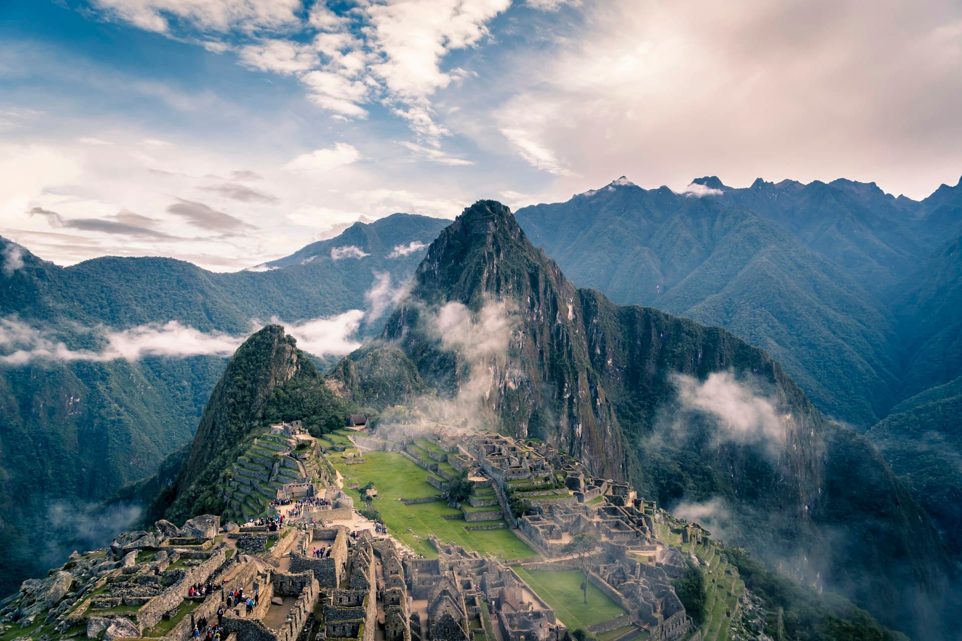 Machu Picchu ruins with misty mountains in Peru